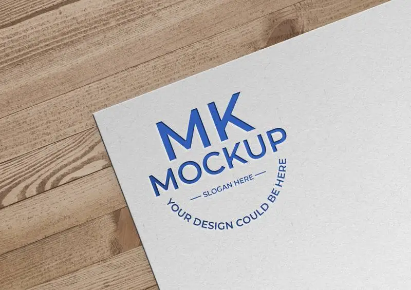 Engraved Text on Paper with Wooden Background Mockup