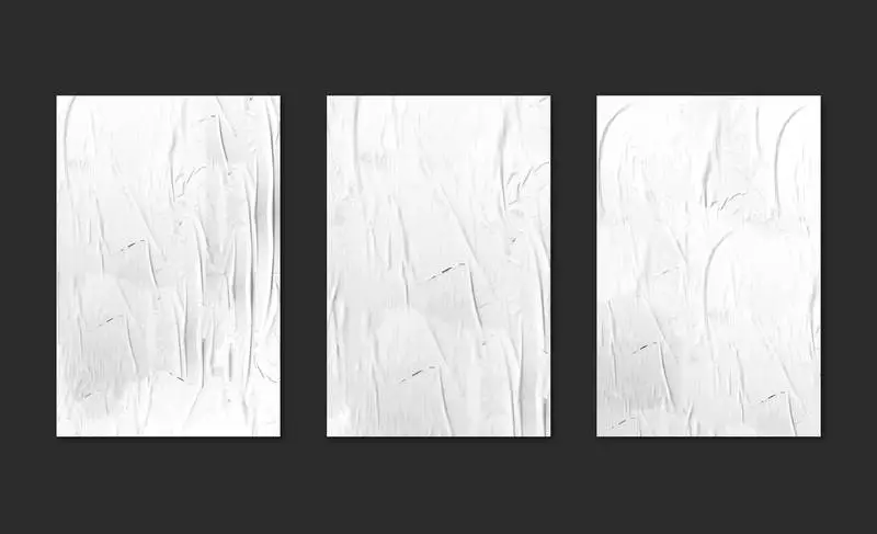 Three White Posters on Black Background Mockup