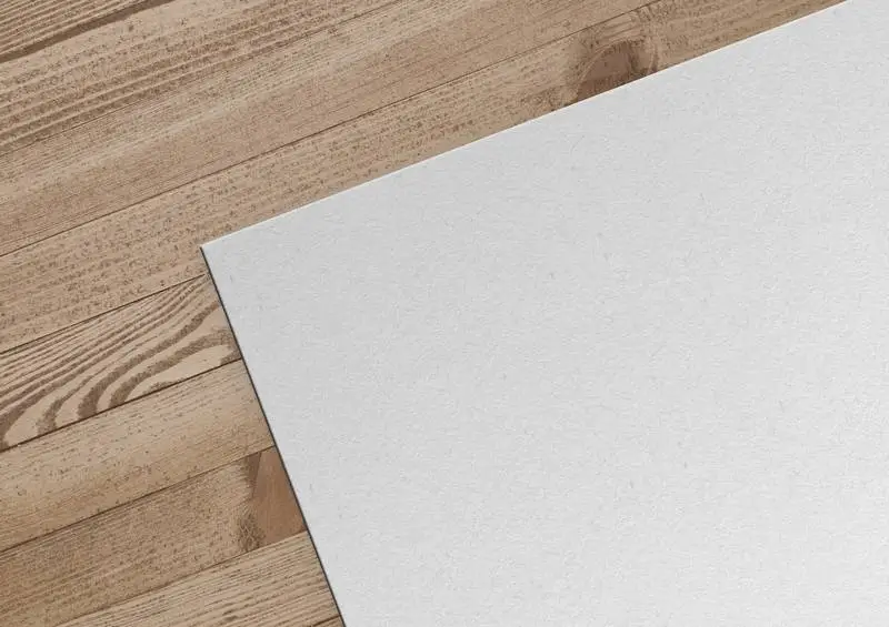 Paper on Wooden Background