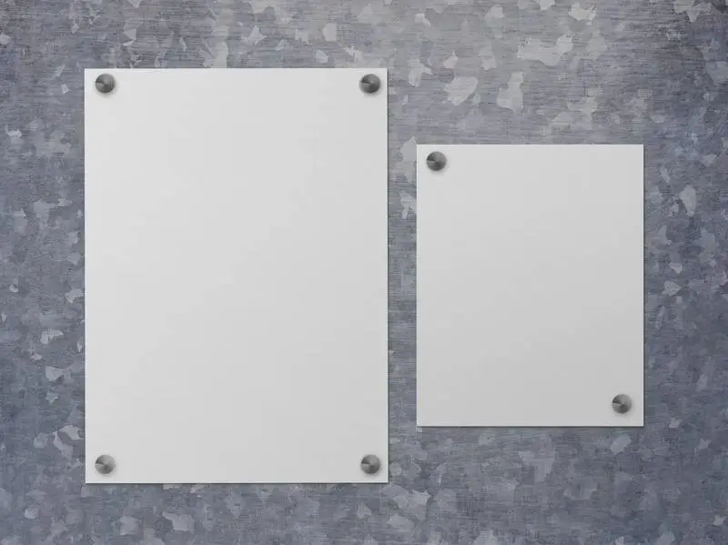 Posters on Steel Surface Isolated