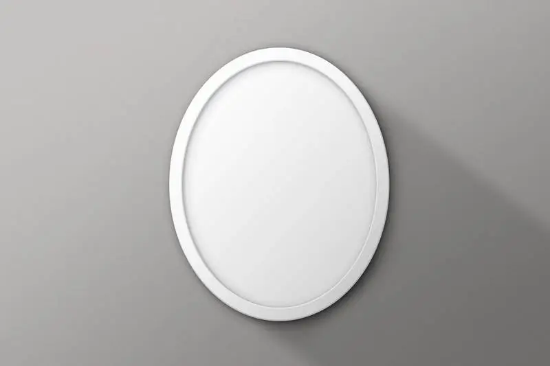 Round White Frame on Grey Surface