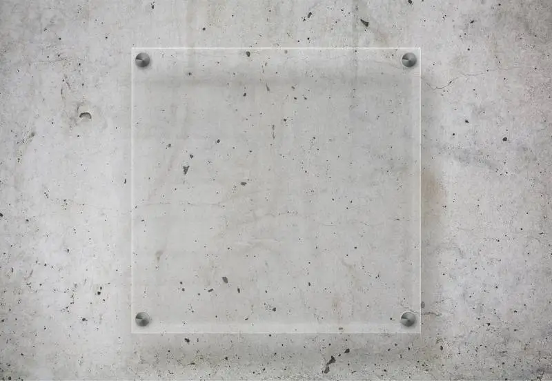 Transparent Plate on Concrete Surface