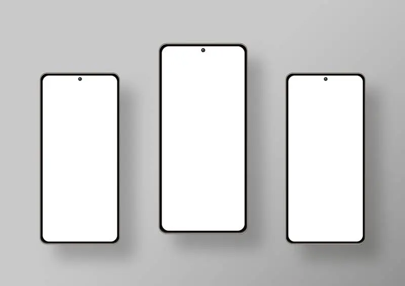 Three Smartphones on Grey Background