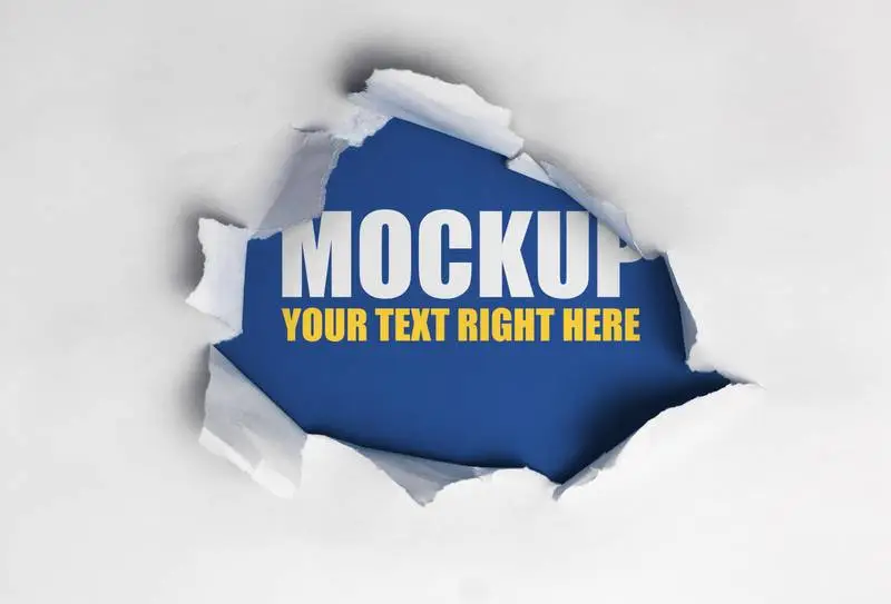 Ripped Paper Over Blue Background Mockup