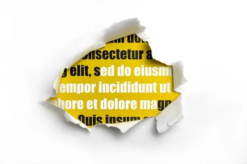 Ripped Paper Over Yellow Background Mockup