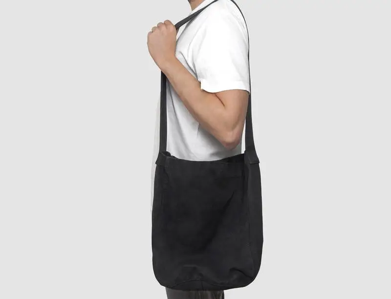 Black Tote Bag Holding Model