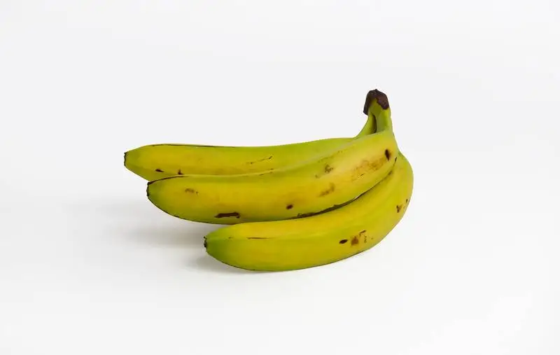 Bunch of Bananas over White Background