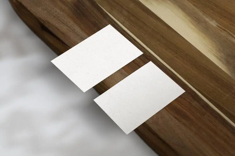 White Business Cards on Wooden Surface