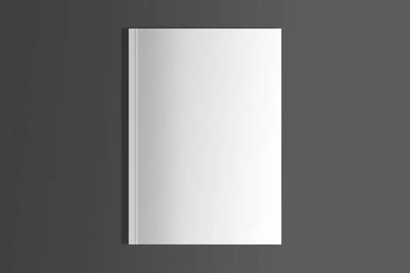 Isolated White Magazine on Black Surface