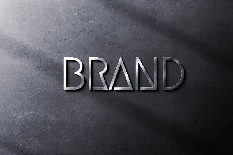 Silver Logo on Blue Rough Wall Mockup