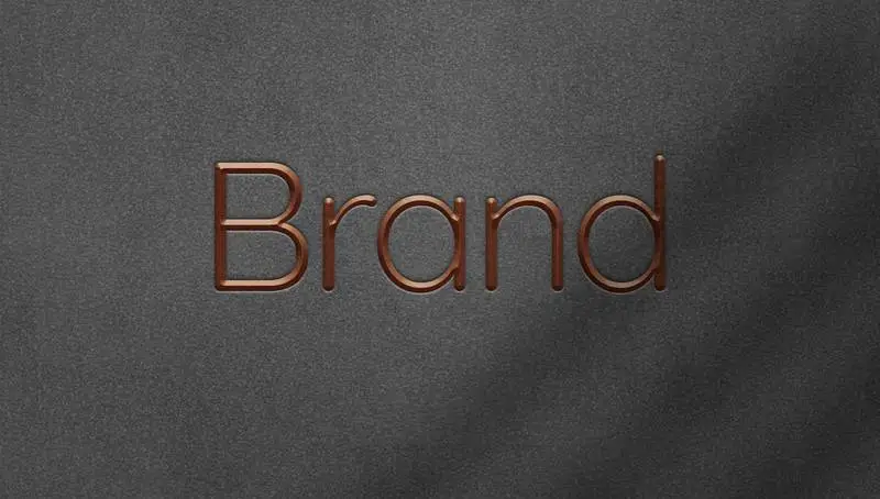 Engraved Metallic Logo on Felt Background
