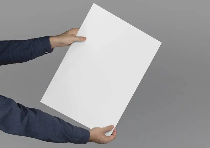 Isolated Composition of Hands Holding a Large-Format Poster