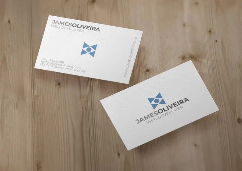 Mockup of Floating Business Cards Over Wood Surface