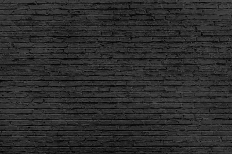 Old Black Brick Wall Background