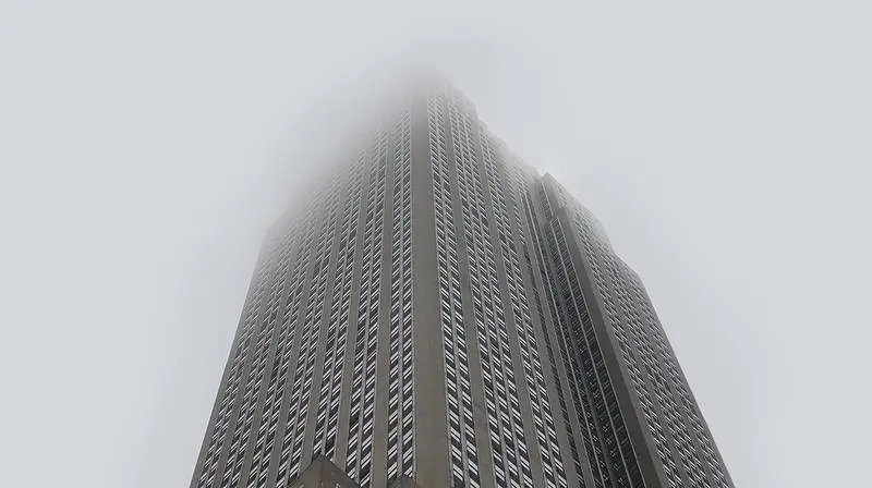 Minimalist Architectural Photo of Skyscraper in Cloudy Weather