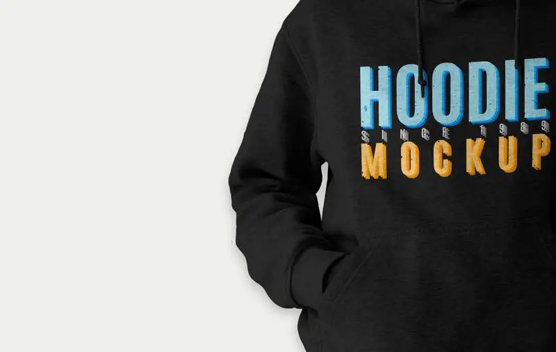 Black Hoodie Over Light Surface Mockup