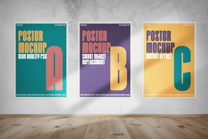 Mockup of Three Posters Hung on Lighted Wall