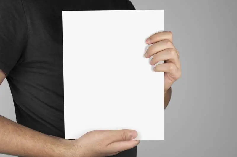 Model Holding a White A4 Poster