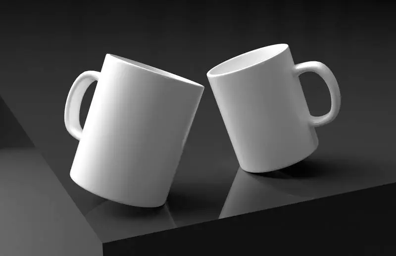 Two White Mugs on an Elegant Black Surface