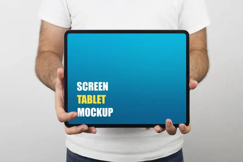 Man Holding a Tablet Pro Mockup