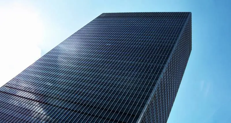Photo of Modern Glass and Metal Building with Diagonal Perspective