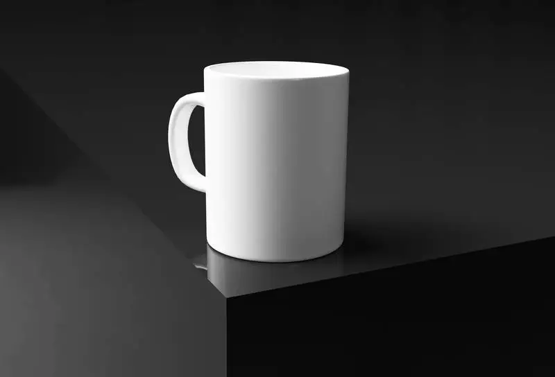 Plain White Mug on Glossy Black Surface