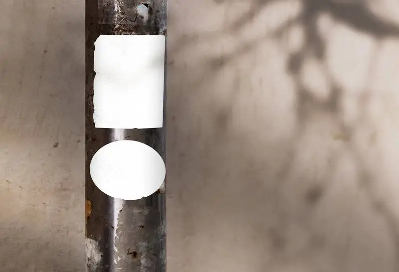 Post with White Stickers with Background Wall