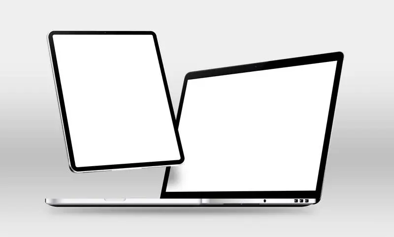 Tablet and Laptop Floating on a Light Background