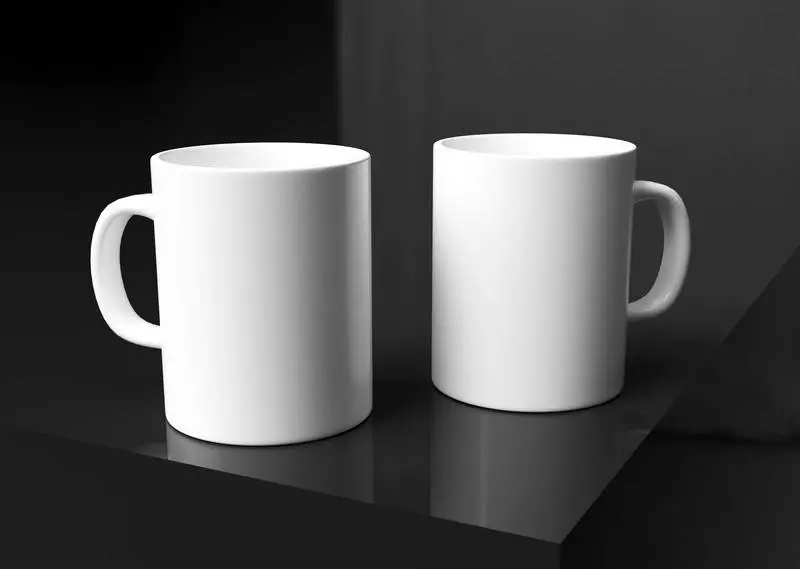 Two Plain White Mugs on Elegant Dark Background