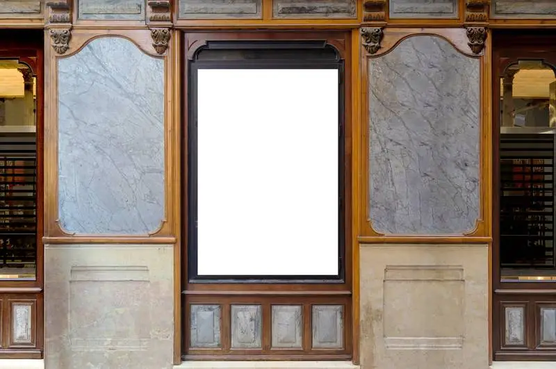 White Poster on the Wall of an Elegant Old Building