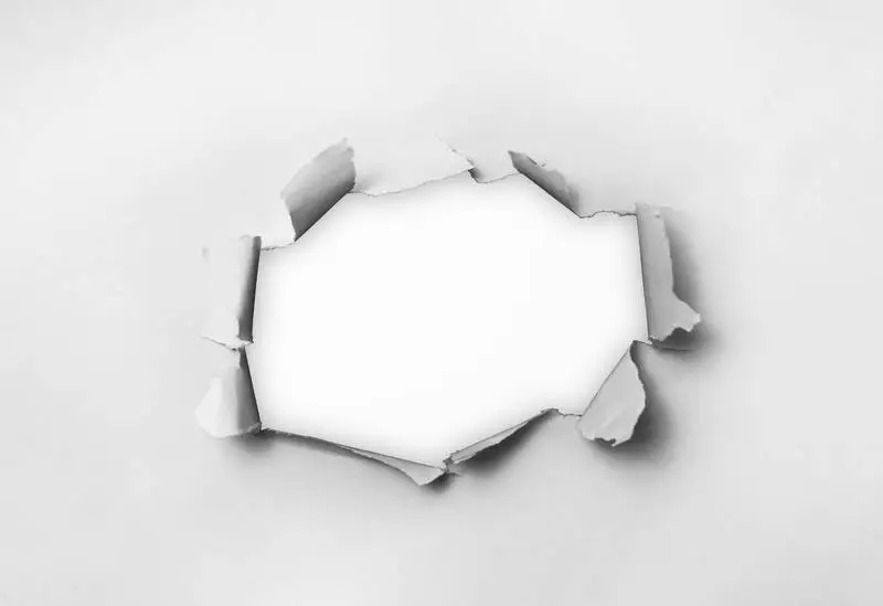 Ripped Paper Over White Background