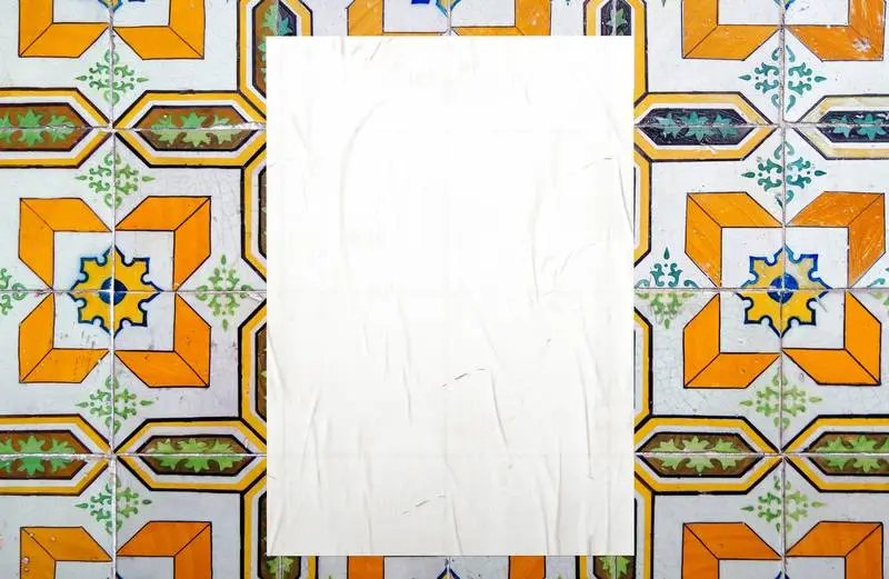 White Poster Glued on a Tiled Wall