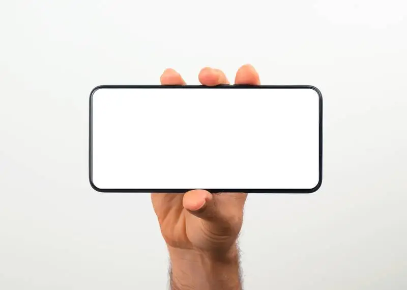 Hand Holding a Horizontal Plain White Smartphone