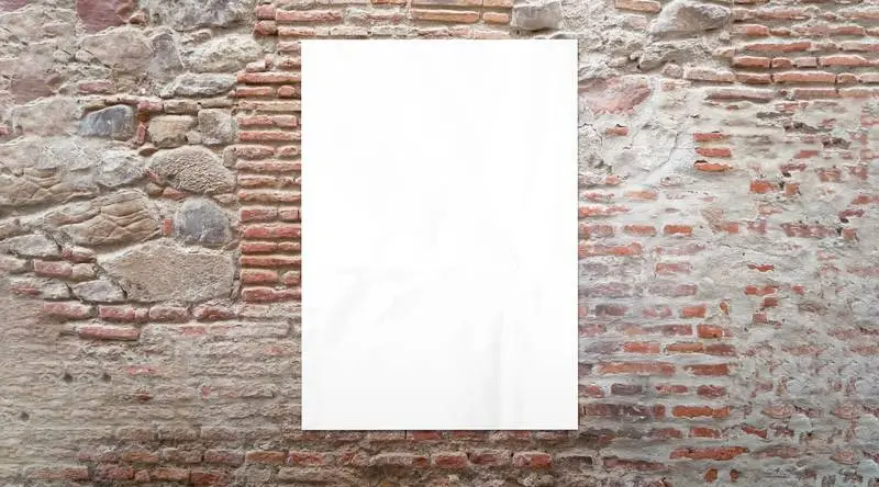 Plain White Poster on a Brick Wall