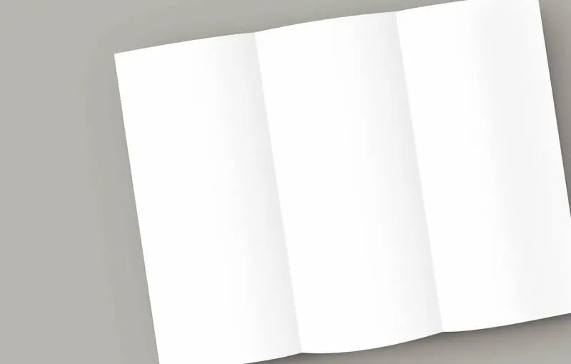 Plain White Trifold Brochure Diagonal on Light Background