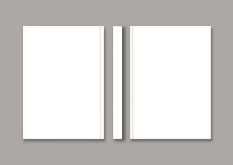 Three Views of a White Book on Light Background