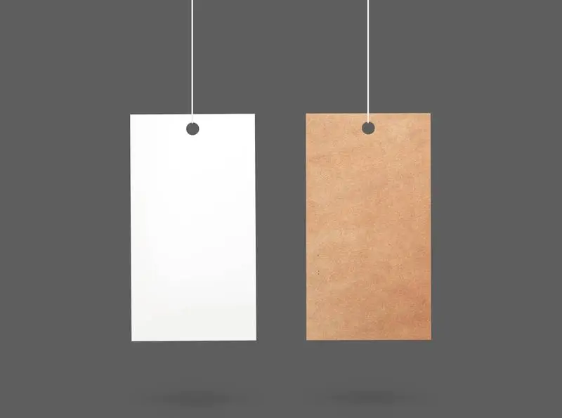 Two Hanging Labels on Plain Background