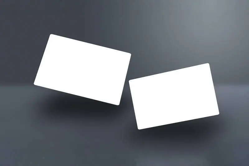 Pair of White Business Cards Floating on a Grey Background