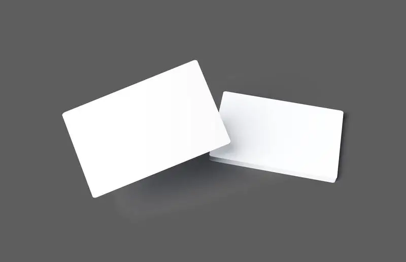 Pair of Diagonally Floating White Business Cards