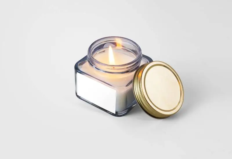 Lighted Candle with Lid and White Label