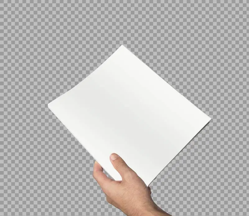 Hand Holding a White Magazine