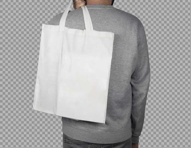 Male Model Holding a White Tote Bag on His Back