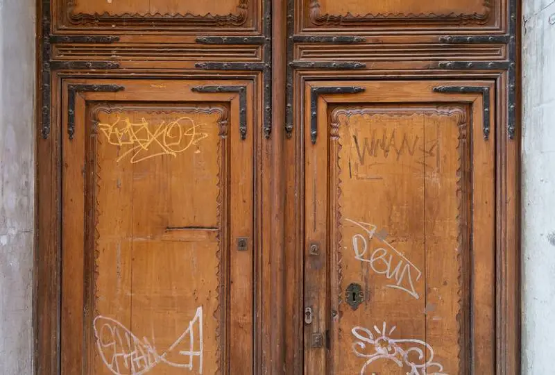 Classic Wooden Door with Graffiti