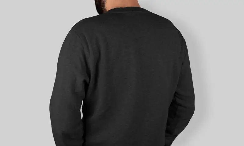 Photo of Model Wearing a Black T-Shirt with Her Back to the Camera