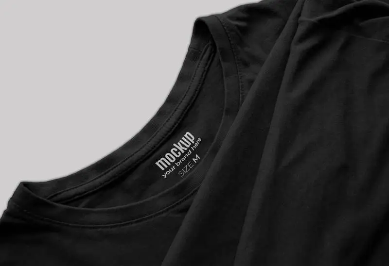 Mockup of Folded Black T-Shirt Label with Pleats