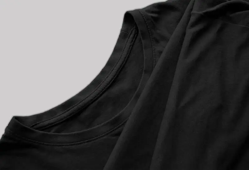Photo of Folded Black T-Shirt Label with Pleats