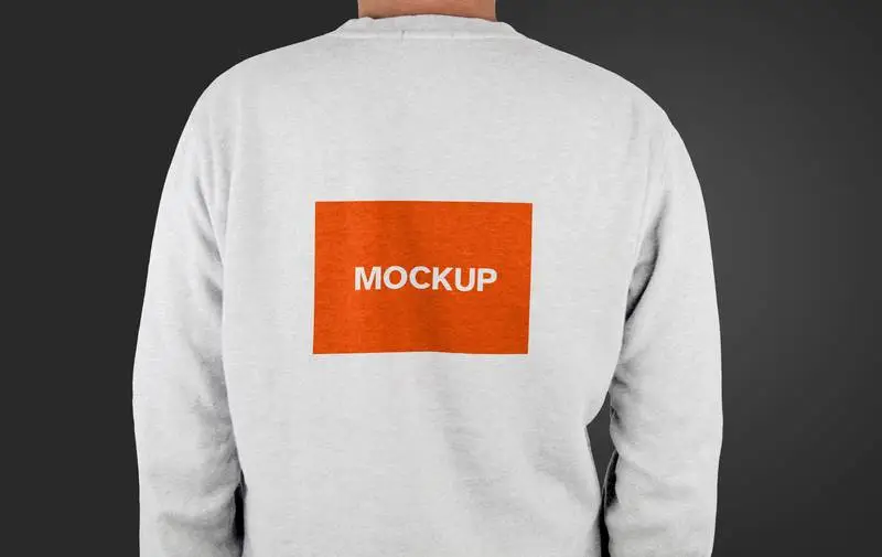 Mockup of a Model with His Back to the Camera Wearing a White T-Shirt