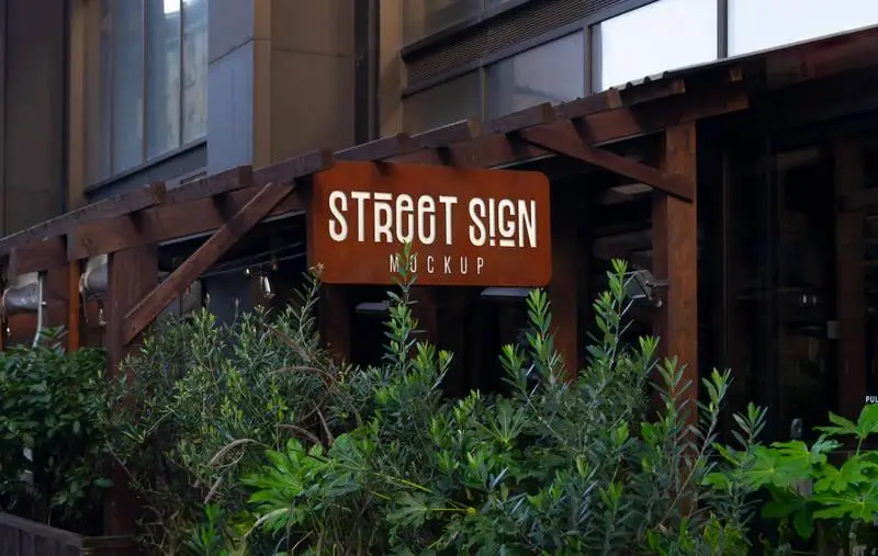Mockup of Wooden Signboard on Street