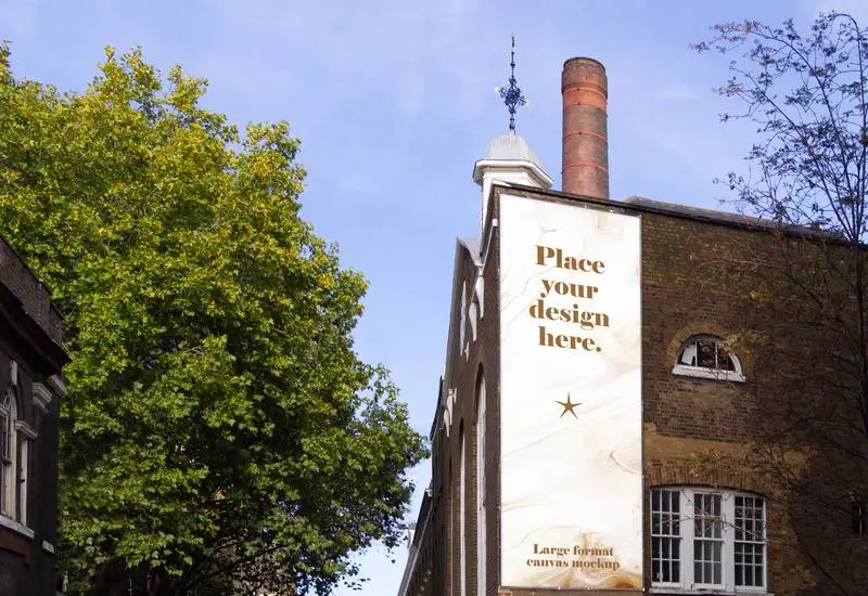 Large Format Vertical Poster Mockup on a Building Facade