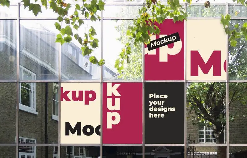 Mockup of Poster Designs on a Wall of Glass Panels